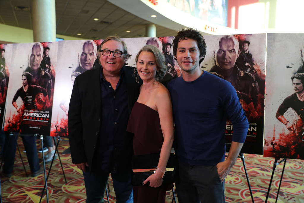 Producer Lorenzo di Bonaventura, Lysa Flynn and Dylan O'Brien at the St. Paul premiere of "American Assassin." (Photo by Adam Bettcher/Getty Images for CBS Films)